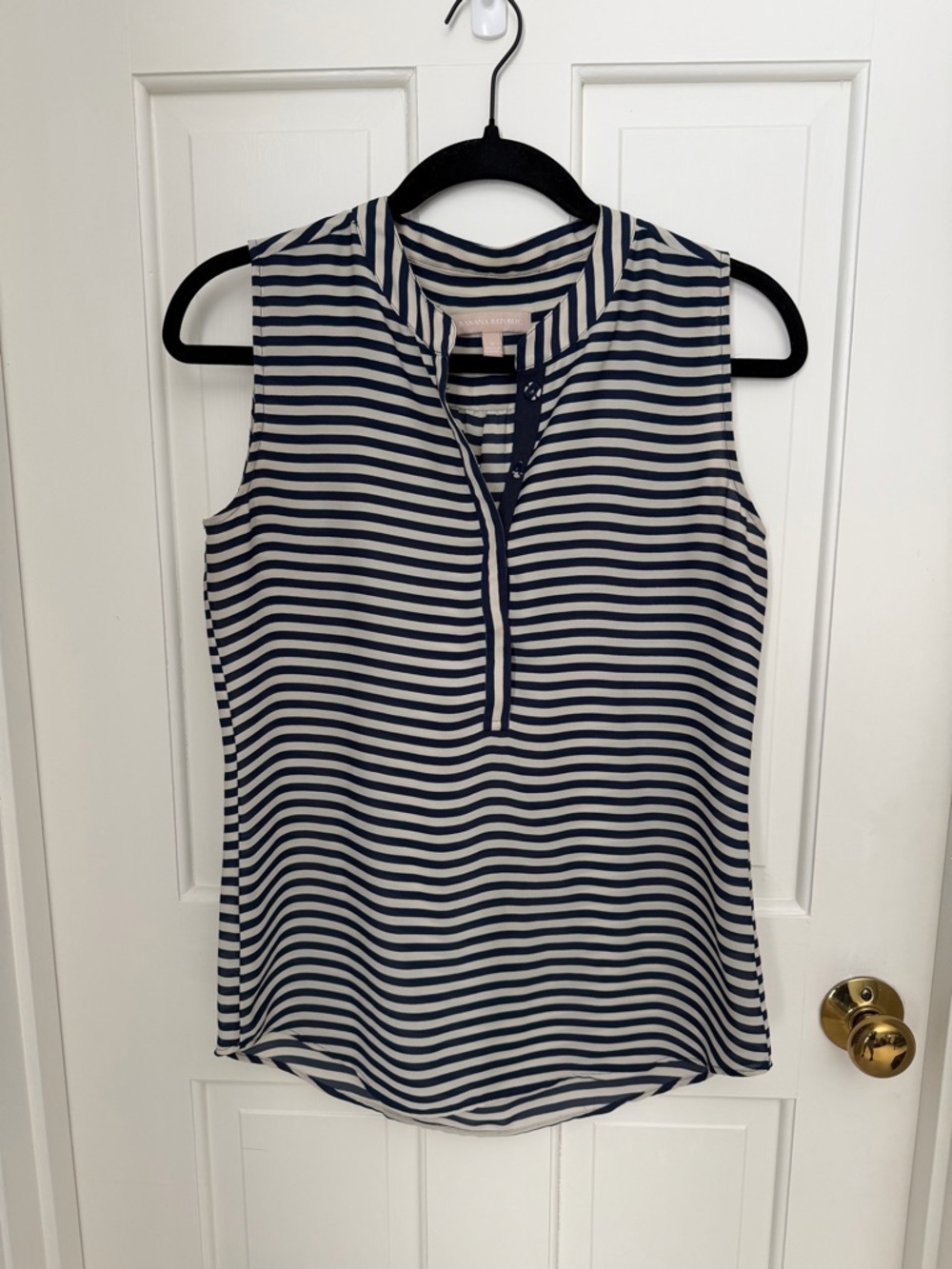 Sleeveless Navy and Cream Striped Split-Neck Blouse